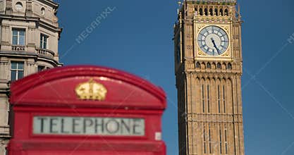 Rack Focus to Big Ben from a Red Telephone Box, London, England