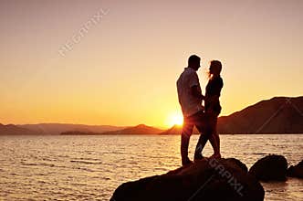 Couple talks at the sea