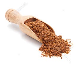 Milled nutmeg on white