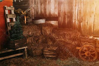 sheaves of hay in a wooden barn. harvesting food dry straw for feeding livestock. rustic country retro scene