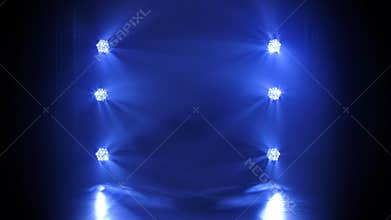 Stage with blue luminescent spotlighting. Shining empty scene for holiday show, award ceremony or advertising on the