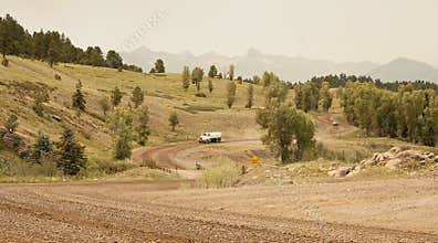 Dirt road spraying