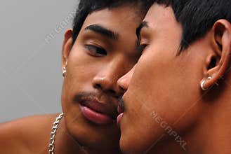 Narcissistic Asian male portrait in mirror