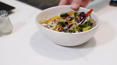 Healthy food concept arugula or salad mix with vegetables. Serve in the kitchen Sweet pepper salad mixed with broccoli