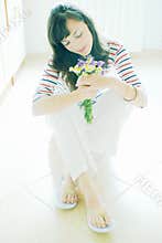 Woman with wildflower bouquet