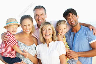 Multi Generation Family Enjoying Beach Holiday