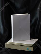 Blank front cover of paperback book or novel book in dark moody style in top view for cover mockup