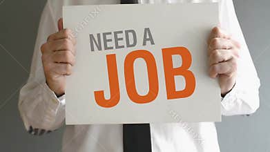 Businessman needs a job. Man holding blackboard with title NEED A JOB