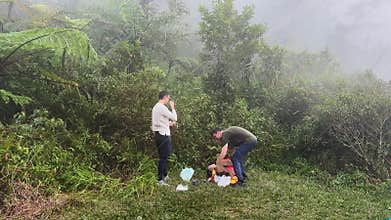 Men travelers hold steaming mugs of freshly brewed coffee