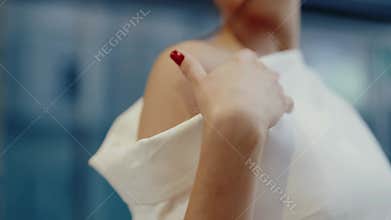 Stylish Woman in a White Top Showcases Modern Elegance and Feminine Fashion