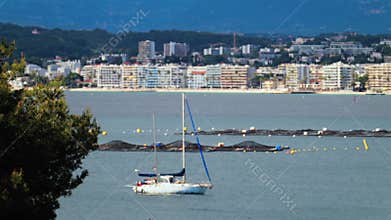 White boat docked on the sea with the bu