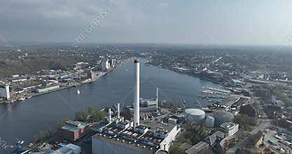 the power plant of Flensburg, Germany, close to border with Denmark, aerial drone video. Energy, power generation, Flensburg