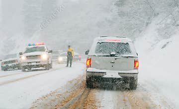 Mountain road in snow storm
