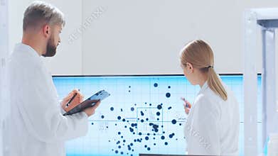 Scientific laboratory filled with various research equipment. Scientists are conducting experiments and research. Science and