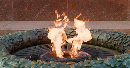 Eternal flame burning at war memorial site