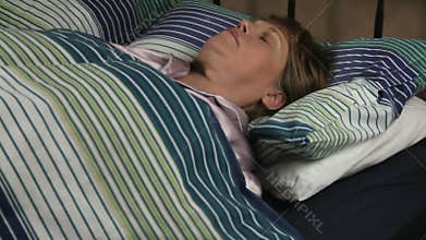 Sleeping Woman Turns Back