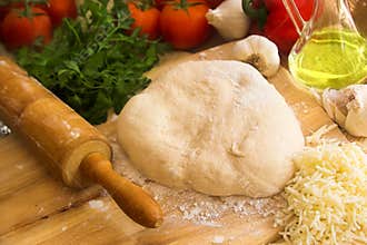 Pizza dough and rolling pin