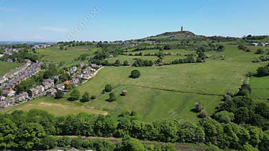 Beautiful drone footage of  Berry Brow and Castle Hill with small households and greenery
