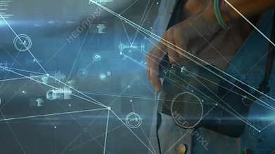 Woman holding camera and rotating focus ring activating data network signalling camera calibration