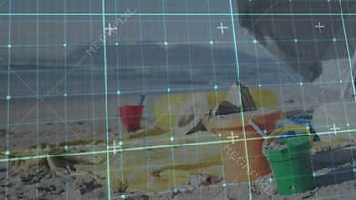 Turquoise grid appearing over sandy beach, drifting down while calibrating lines and scanning toys