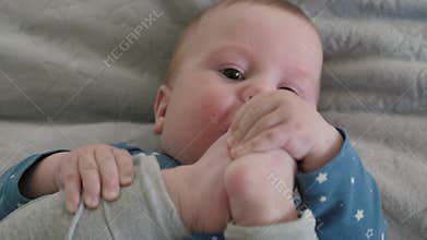 Adorable Baby Playing with Feet