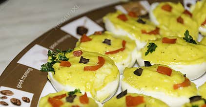 Garnished stuffed eggs close-up
