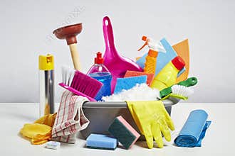House cleaning products pile on white background