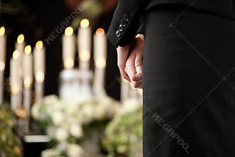 Woman at funeral mourning