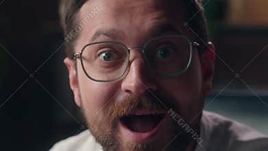 Close up happy shocked Caucasian leader guy middle-aged glad business man looking at camera in office male businessman