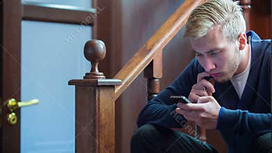 Businessman Playing Mobile Phone