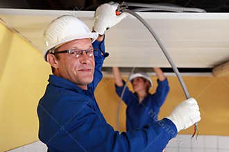 Electricians at work