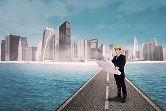Man with blueprint
