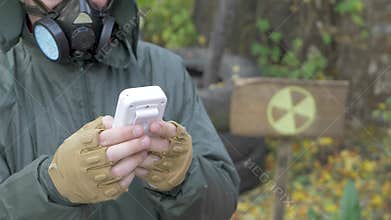 Unrecognizable inspector uses Geiger counter