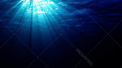 Underwater light creates a beautiful veil, consisting of sunlight. Seamless loop
