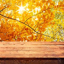 Empty wooden deck table with tablecloth