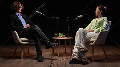 Inspiring Conversations Unfold in a Cozy Podcast Studio Setup