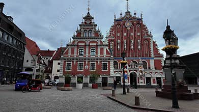 Scenic view of the House of the Blackheads in Riga with tourists gathered in the square