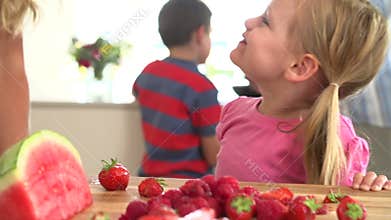 Slow Motion Sequence Of Girl Eating Strawberry