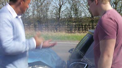 Two Drivers Arguing After Traffic Accident
