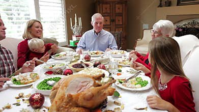 Multi Generation Family Enjoying Thanksgiving Meal
