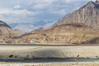 Breathtaking mountain landscape with \"Sarfaranga Shigar Cold Desert\" name on the mountain in Skardu, Pakistan