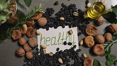 A visually appealing healthy food display featuring an assortment of nuts and vibrant fruits