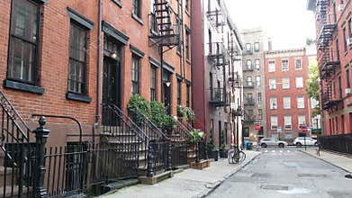 New York City building architecture. Urban residential house exterior. Real estate. Red brick facade