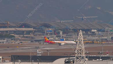 Hong Kong Airlines Airbus A321 taxiing, long shot