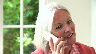 Slow Motion Sequence Of Middle Aged Woman On Phone
