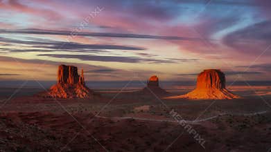 Side-Lit Buttes Glowing in Fiery Twilight