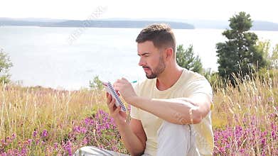 Author writing around inspiring nature