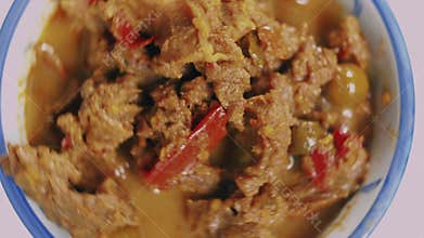 Close up top view and rotating scenes of Thai traditional food. Beef curry Thai style.