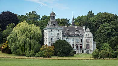 In Dalhem, Belgium, on the edge of the Land of Herve, stands a young castle built between 1912 and 1914.