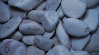 white pebbles with a white background